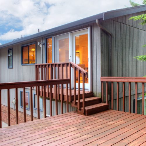 new deck installed outside a house